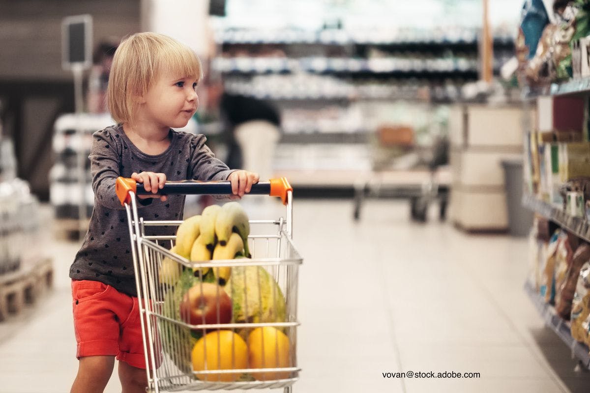 child in grocery story