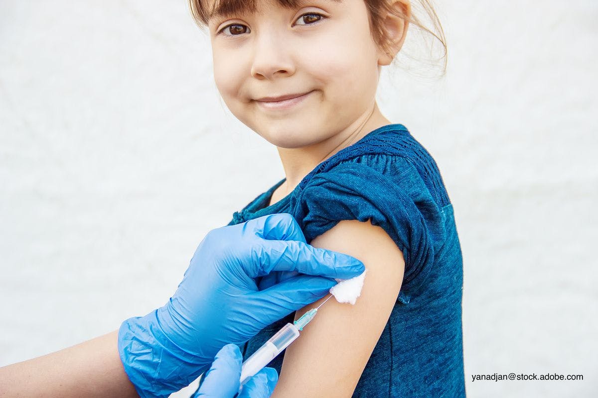 child receiving influenza vaccine