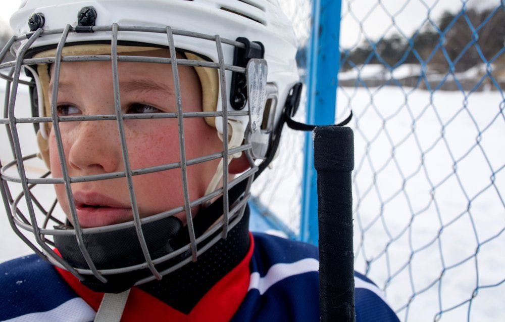 stock image of child hockey player
