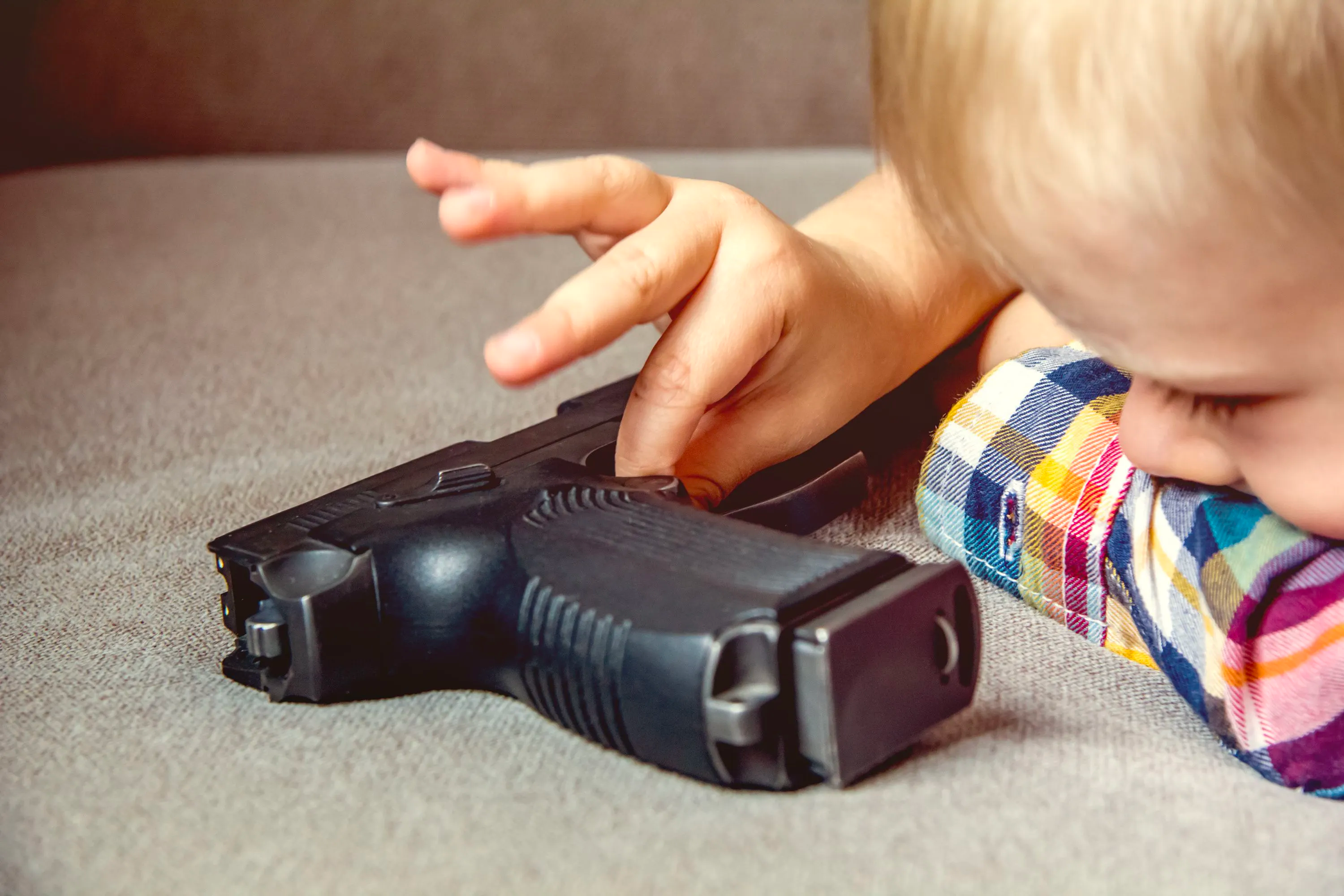 CDC:Unlocked, loaded firearms significantly contribute to accidental firearm deaths in children | Image Credit: © Александра Замулина - © Александра Замулина - stock.adobe.com.