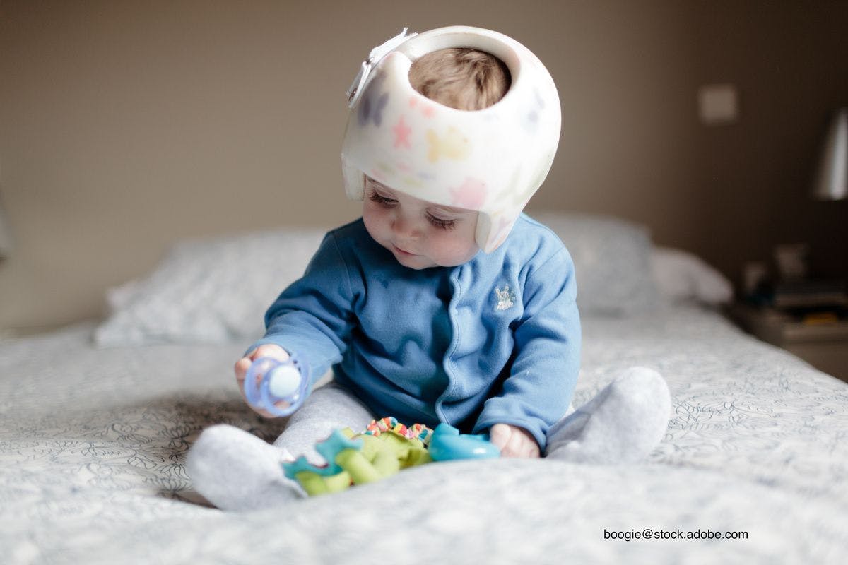 child with helmet