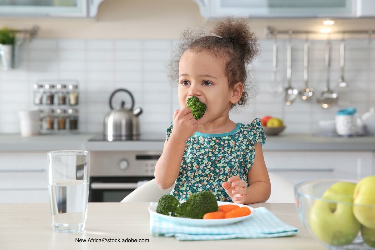 kid eating veggies