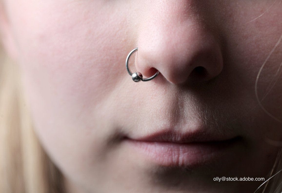 teen with piercing
