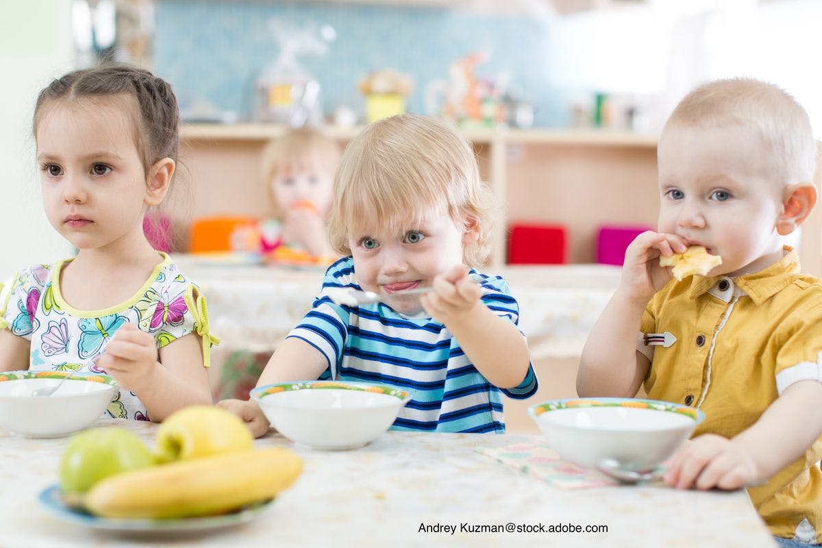children at daycare eating