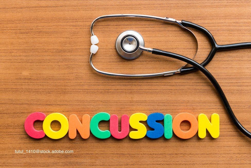 magnetic letter spelling out concussion