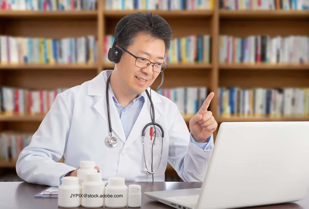 Doctor caring for a patient via telemedicine