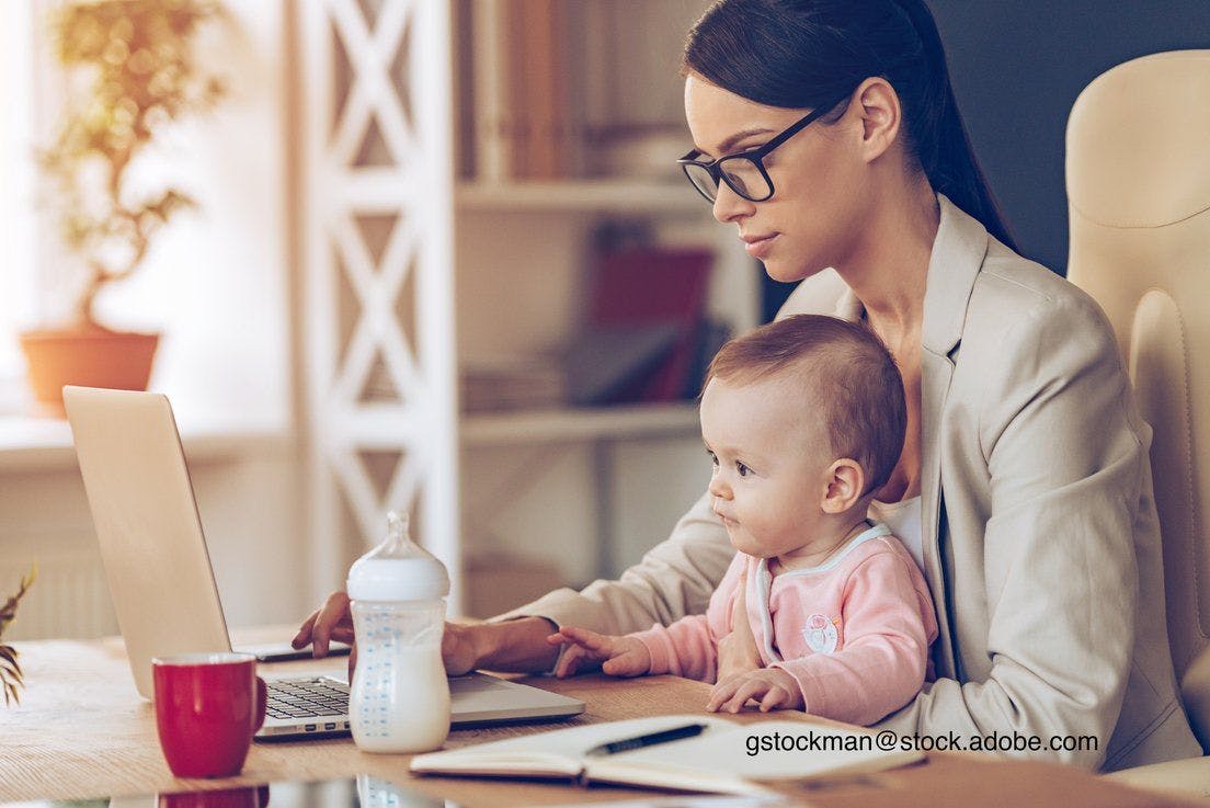 image of woman and baby at the computer