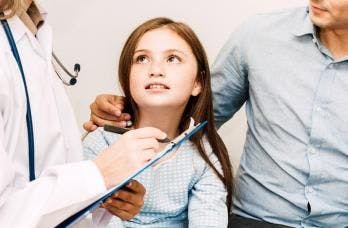 child at doctor for screening